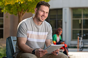 Western student studying in the courtyard