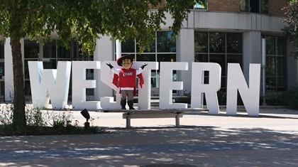Cal the Cavalier with Western letters.